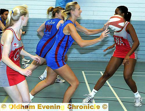 LET’S GO . . . Oldham’s Emma Dovey sets up an attack against Linden. LET’S GO . . . Oldham’s Emma Dovey sets up an attack against Linden.