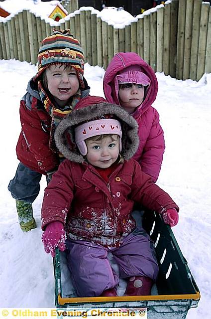 ALL wrapped up . . . (from left) Fletcher Harris, Imogen Whittaker and Cerys Shaw get to grips with the snow 