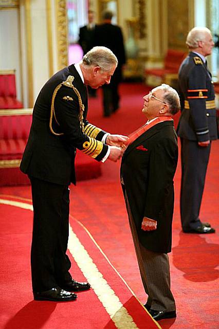 Mr. Norman Stoller is made a CBE by the Prince of Wales at Buckingham Palace. Lewis Whyld/PA Wire Mr. Norman Stoller is made a CBE by the Prince of Wales at Buckingham Palace. Lewis Whyld/PA Wire