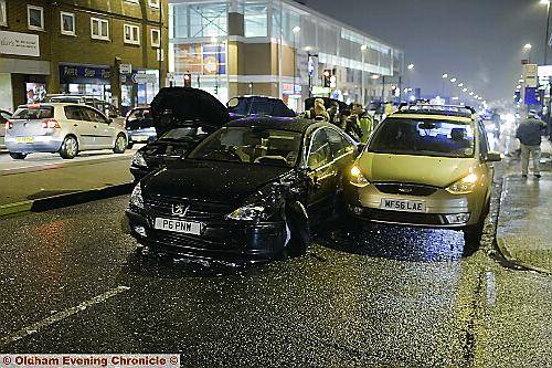 Two of the cars damaged in the nine-vehicle collision that brought rush-hour traffic to a standstill 