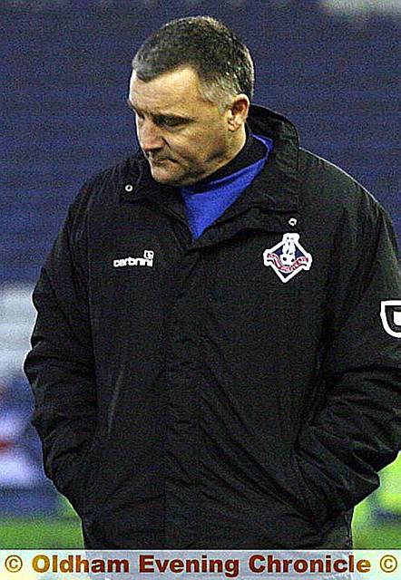 FORLORN FIGURE: Athletic manager Dave Penney heads for the tunnel after witnessing a 1-0 defeat at the hands of Millwall. 