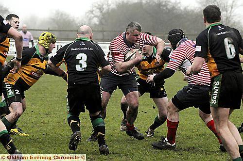 ON THE CHARGE . . . Paddy Farnan makes the hard yards for Oldham.
ON THE CHARGE . . . Paddy Farnan makes the hard yards for Oldham.