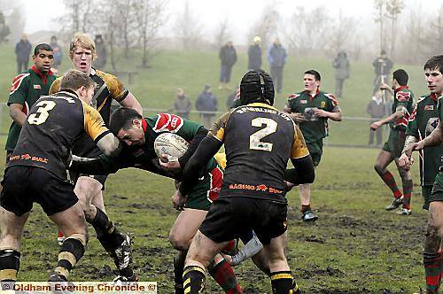 FORWARD THRUST: Waterhead's Sean Garrett tries to make ground. 