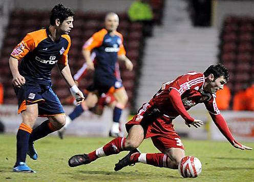 SPOT OF BOTHER: Charlie Austin takes a tumble after a push from Joe Jacobson 