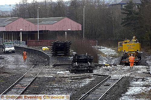 Workmen remove the railway track and sleepers from alongside Mumps train station in preparation for the Metrolink Workmen remove the railway track and sleepers from alongside Mumps train station in preparation for the Metrolink