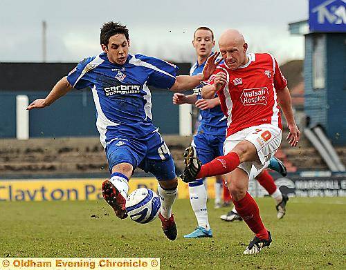 Dean Furman makes an important block to thwart a rare Walsall raid.  