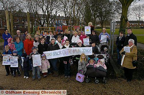 PARK strife . . . mums, carers and children protest at Higher Failsworth Park where playground railings have been removed PARK strife . . . mums, carers and children protest at Higher Failsworth Park where playground railings have been removed