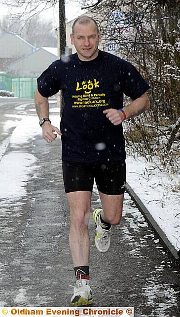 IN training . . . Special Constable Bobby Crabb prepares for Sunday’s fun-run 