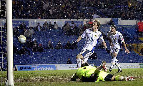 TROUBLE: Luciano Becchio pounces on an error by Athletic goalkeeper Dean Brill to put Leeds United ahead 