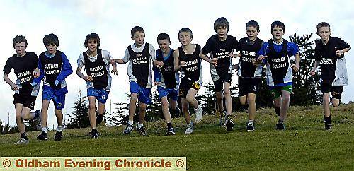 LAP OF HONOUR: Oldham Schools Year Seven athletes Chris Brown (left), George Kilgour, Harry Lord, Daniel Holmes, Fionn Wall, James Hey, Bradley Healey, Matthew Walls, Connor Chadderton, Henri Jones. LAP OF HONOUR: Oldham Schools Year Seven athletes Chris Brown (left), George Kilgour, Harry Lord, Daniel Holmes, Fionn Wall, James Hey, Bradley Healey, Matthew Walls, Connor Chadderton, Henri Jones.