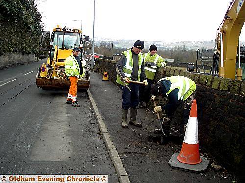 Men at work . . . Huddersfield Road, Diggle 
