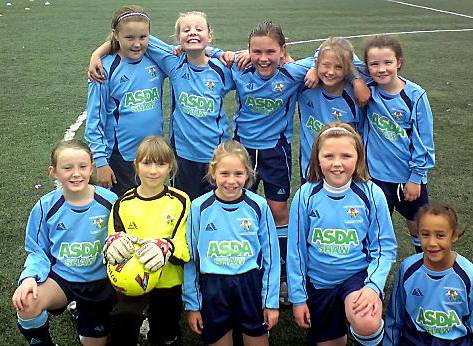 MILES OF SMILES: Heyside Angels Blues under-10s are celebrating North Manchester Girls League glory. The girls claimed top honours in style, beating Denton Tigers 6-0 thanks to two goals apiece from Robyn Hartley, Beth Boothroyd and Rachael Pollinger. 