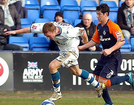 ATHLETIC full-back Joe Jacobson and Tranmere Rovers’ Craig Curran fight for the ball. 