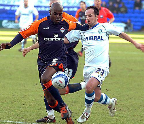 NO WAY THROUGH: Athletic defender Reuben Hazell keeps a close eye onTranmere Rovers midfielder Chris Shuker.