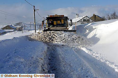 FLASHBACK to last month as a snow plough clears Buckstones Road, close to the Black Ladd pub near Shaw FLASHBACK to last month as a snow plough clears Buckstones Road, close to the Black Ladd pub near Shaw