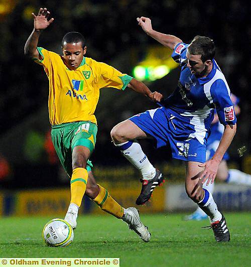 KEY MAN . . . Dale Stephens (right) has established himself in Athletic’s midfield. 