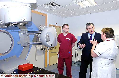 Mr Brown meets the staff who operate the state of the art linear accelerator 