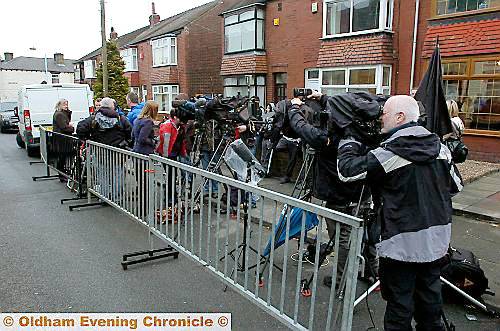 MEDIA frenzy . . . cameramen gather in Queen Street in anticipation of Sahil’s return 