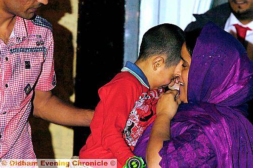 HOME to mum . . . emotions run high as Sahil is reunited with mum 