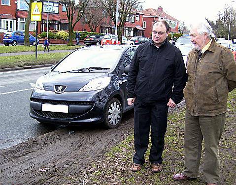 RUINED . . . Councillors Philip Rogers (left) and Jack Hulme inspect the damaged verges
RUINED . . . Councillors Philip Rogers (left) and Jack Hulme inspect the damaged verges