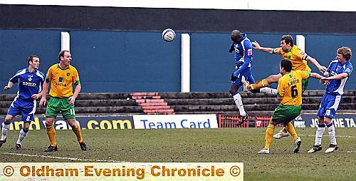 DENIED AT THE DEATH: Athletic defender Rueben Hazell heads towards the Norwich City goal, only to see the effort cleared off the line by Korey Smith.