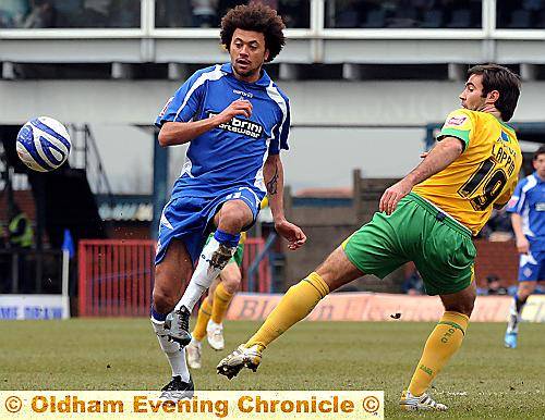 NEAT FEAT: On-loan Athletic forward Jason Price turns inside Norwich City midfielder Simon Lappin.