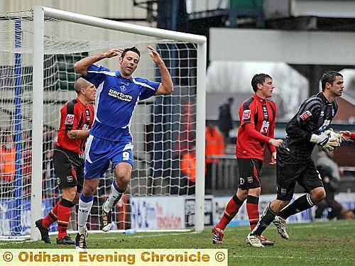 ATHLETIC striker Pawel Abbott reacts after a chance goes begging. 