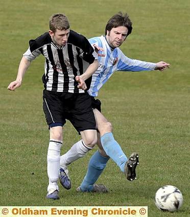 ANDY Cropper (right) of Oddies, beats Failsworth Athletic’s Drew Wilson to the ball. ANDY Cropper (right) of Oddies, beats Failsworth Athletic’s Drew Wilson to the ball.
