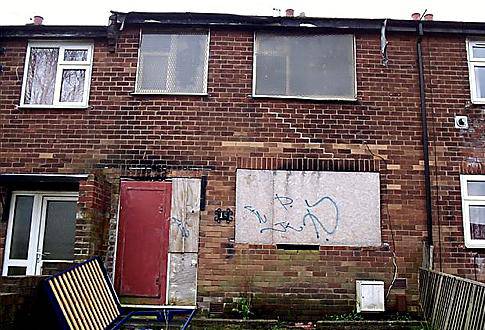 BEFORE . . . a scruffy, run-down property 