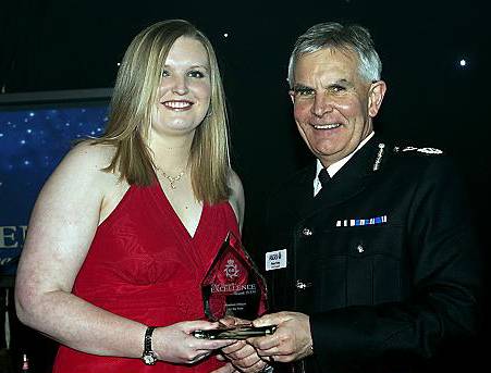 PC Kat Murray is presented with her Student Officer of the Year Award by Chief Constable Peter Fahy. 
