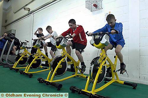WHEELY GOOD . . . these enthusiastic students test their stamina and endurance with a spot of cycling. 