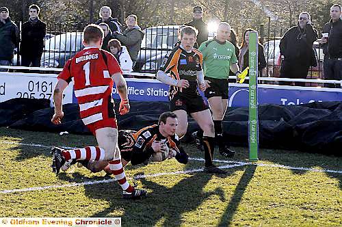 SO SIMPLE . . . Paul O’Connor is unchallenged as he touches down in the corner. 
