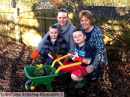 IN bloom . . . Gill Thomas (left) and Joan Thomas with Gill’s sons Connor (left) and Tom IN bloom . . . Gill Thomas (left) and Joan Thomas with Gill’s sons Connor (left) and Tom