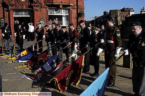 TRIBUTE . . . Standard bearers at the unveiling of the memorial stones at Oldham’s war memorial 
