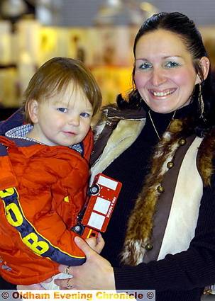 HAPPIER times . . . Claire Smith and son Dallas HAPPIER times . . . Claire Smith and son Dallas