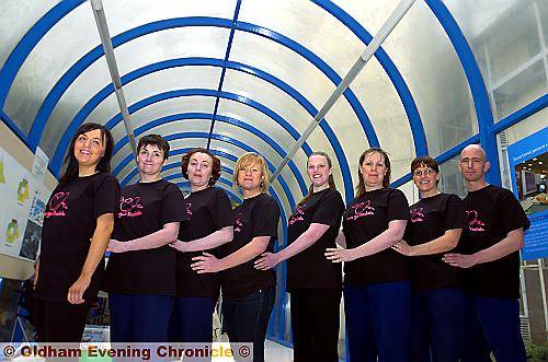 MOUNTAIN to climb . . . from left, Laura Robinson, Lorraine Milton, Zoey Stansfield, Kathy Moore, Joanne Finnigan, Jane Tunstall, Joanne Minshull and Mick Hitchon 
