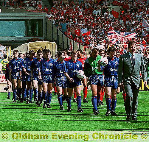 DAY TO REMEMBER... Joe Royle leads out Athletic at Wembley before their 1-0 defeat at the hands of Brian Clough’s Nottingham Forest. DAY TO REMEMBER... Joe Royle leads out Athletic at Wembley before their 1-0 defeat at the hands of Brian Clough’s Nottingham Forest.