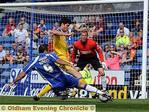 ON THE STRETCH: Pawel Abbott (left) attempts to get in a shot at the Southend United goal.