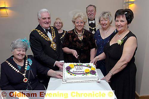 HAPPY anniversary . . . the Mayoress of Oldham, Councillor Kay Knox, cuts the cake with (from the left) Shaw Parish Council chairman Mari Wisewell; Mayor of Oldham Councillor Jim McArdle; Saddleworth Parish Council chairman Alma McInness; Ian McInnes; league secretary Anne Morris and league chairman Rose Hall HAPPY anniversary . . . the Mayoress of Oldham, Councillor Kay Knox, cuts the cake with (from the left) Shaw Parish Council chairman Mari Wisewell; Mayor of Oldham Councillor Jim McArdle; Saddleworth Parish Council chairman Alma McInness; Ian McInnes; league secretary Anne Morris and league chairman Rose Hall