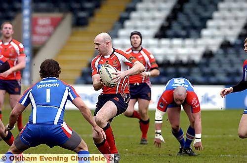 Neil Roden gets Oldham going forward against Hornets. 
