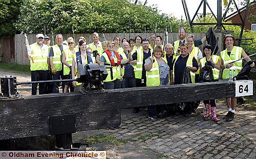WATER clean-up . . . volunteers during the Towpath Tidy event at lock 64 on the Rochdale Canal WATER clean-up . . . volunteers during the Towpath Tidy event at lock 64 on the Rochdale Canal