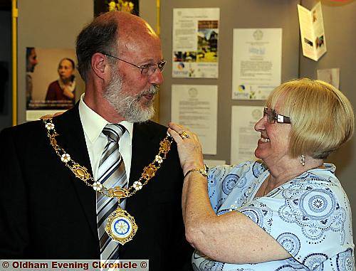 HUMBLED . . . Councillor Begley received the chain of office from outgoing chairman Councillor McInness 