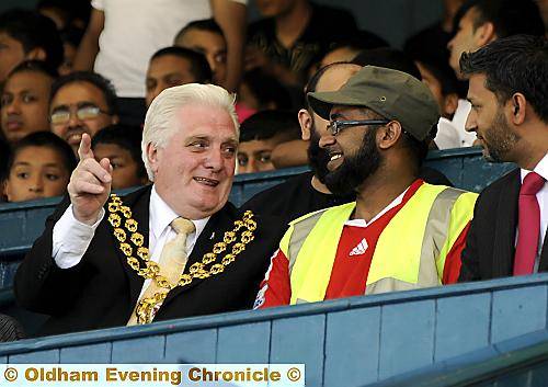 OUTGOING Mayor Jim McArdle chats to organisers at the match 