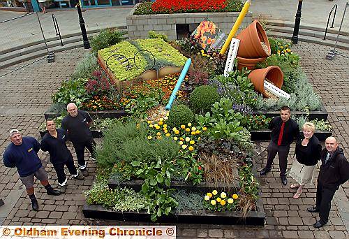 IN bloom . . . part of last year’s North-West in Bloom entry outside Spindles with the project team IN bloom . . . part of last year’s North-West in Bloom entry outside Spindles with the project team