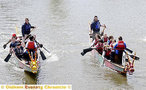 HAVING a splashing time . . . competitors in the dragon boat race 