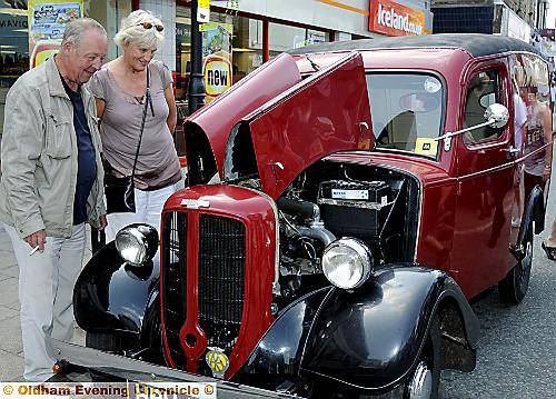 Roger Dennis and Joan Dennis look at a veteran Bradford Van at Crompton 