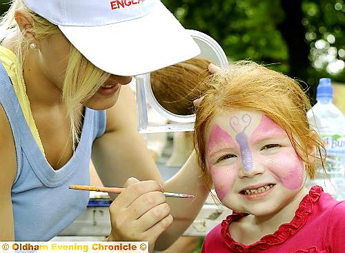 Pictured is Ellie Corbley (3), having a butterfly painted on her face by Amy Powell, from Oldham Play Action Group (OPAG). 

To view all the pictures taken at the event and for details on how to order them, go to www.oldham-chronicle.co.uk  or call our promotions department on 0161-622 2130. 