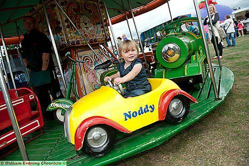Sophie Walsh Roberts enjoys a fairground ride 