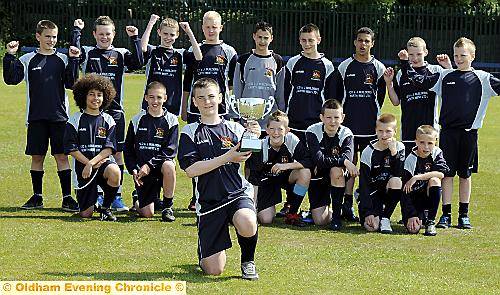 TROPHY TIME . . . Hollinwood FC under-13s, with captain Jack Holmes at the front, completed the Tameside and District League and cup double. The talented youngsters will be gunning for more glory in the under-14s division when the new season gets under way TROPHY TIME . . . Hollinwood FC under-13s, with captain Jack Holmes at the front, completed the Tameside and District League and cup double. The talented youngsters will be gunning for more glory in the under-14s division when the new season gets under way
