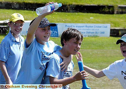 WATER relief: Thorp School stars celebrate their victory at Royton in the Asda Kwik cricket tournament.